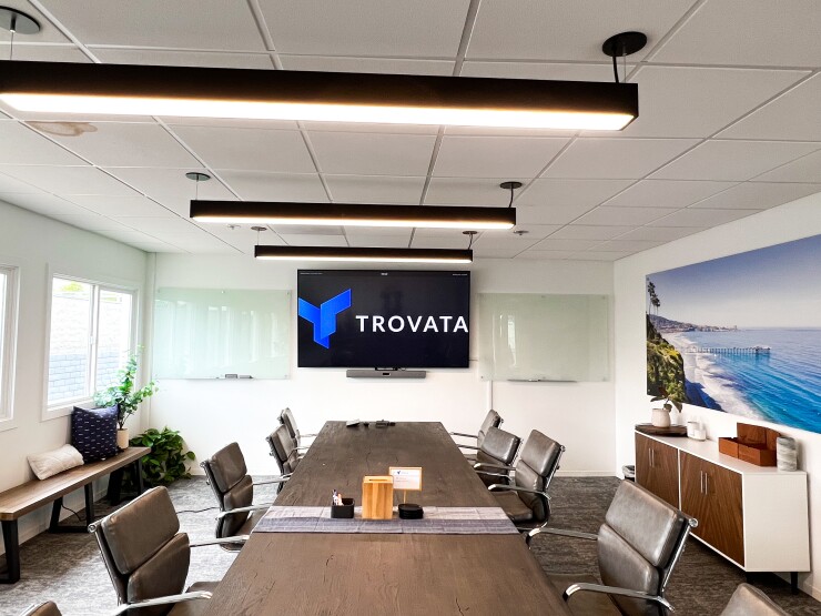 Trovata buys treasury software; fundraises from...